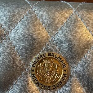 Pierre Balmain Silver Quilted Clutch with Gold Crest